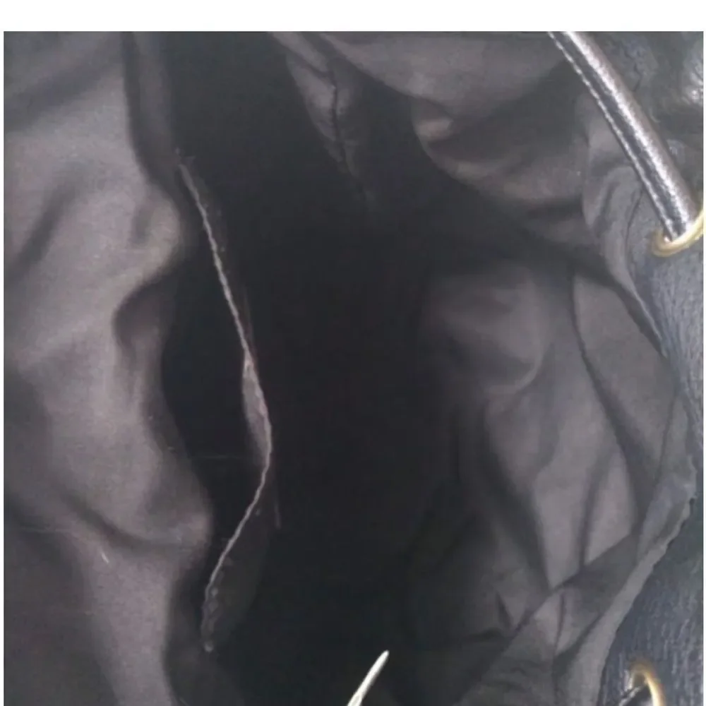 Express Black Backpack with Gold Ring Detail Amazon.com: COACH Kisslock Frame Backpack, B4/Black One Size  main image 2